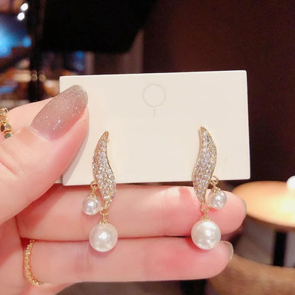Boucle d'Oreille Double Perle