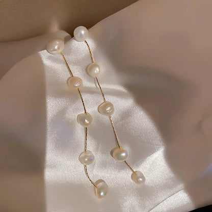 Boucle d'Oreille Longue Perle