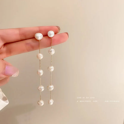 Boucle d'Oreille Longue Perle
