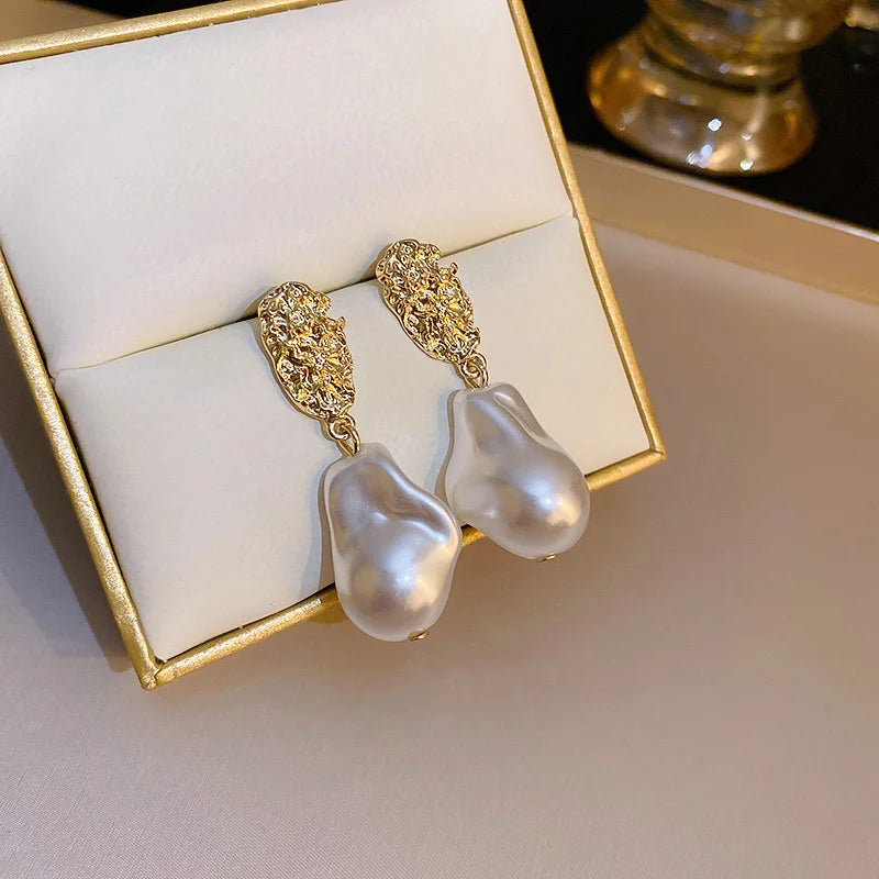 Boucle d'Oreille Noeud Perle