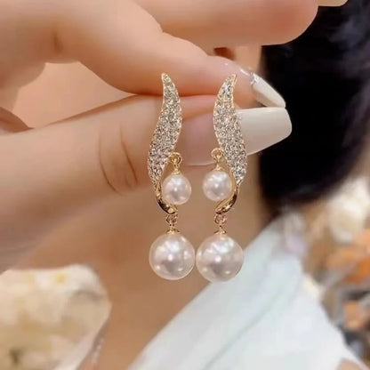Boucle d'Oreille Double Perle