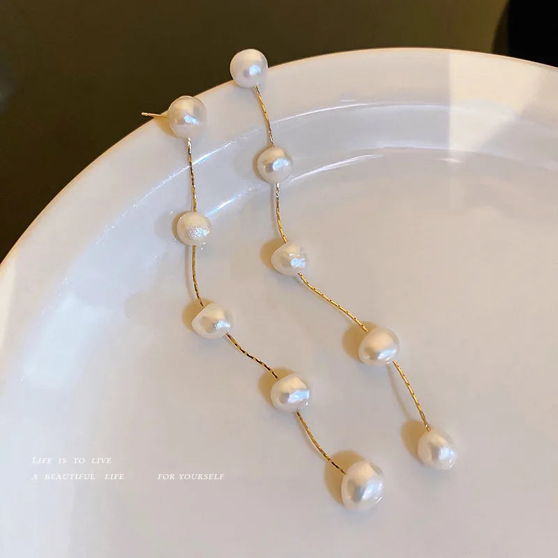 Boucle d'Oreille Longue Perle