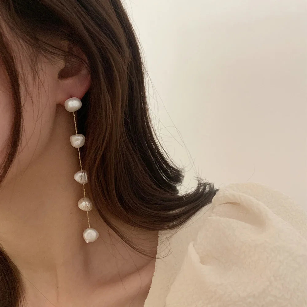 Boucle d'Oreille Longue Perle