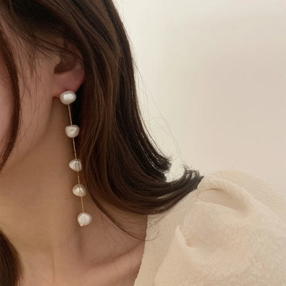 Boucle d'Oreille Longue Perle