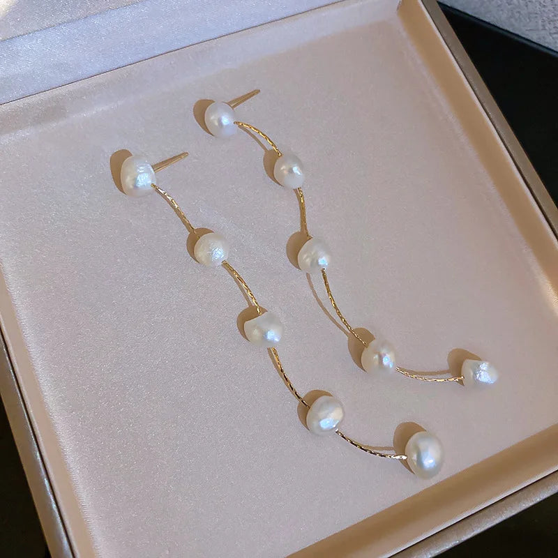 Boucle d'Oreille Longue Perle
